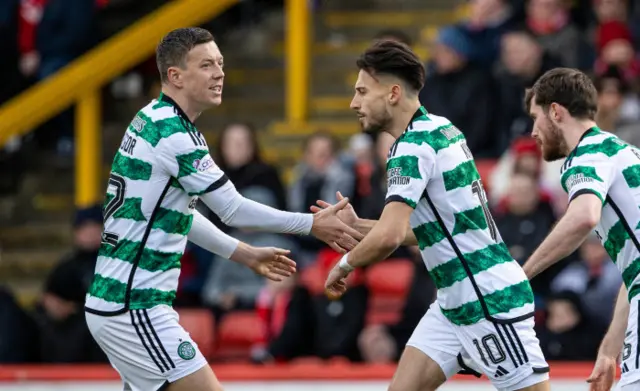 Celtic players celebrate Nicolas Kuhn's goal against Aberdeen