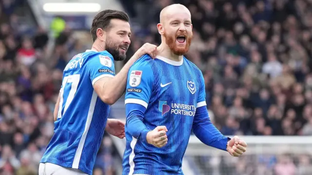 Portsmouth celebrate a goal against Northampton