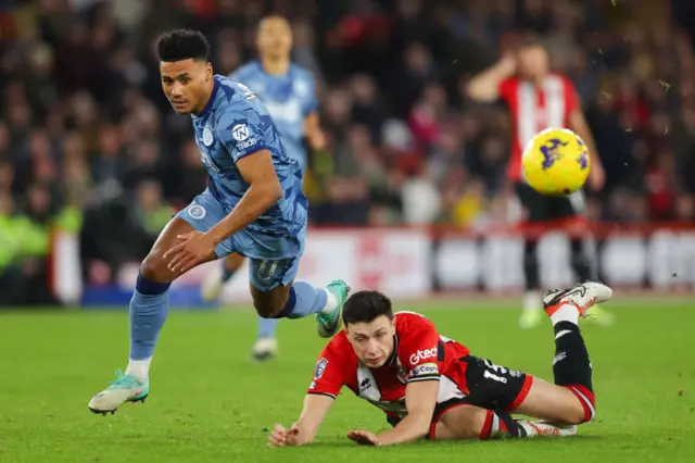 Ollie Watkins hunts down the ball