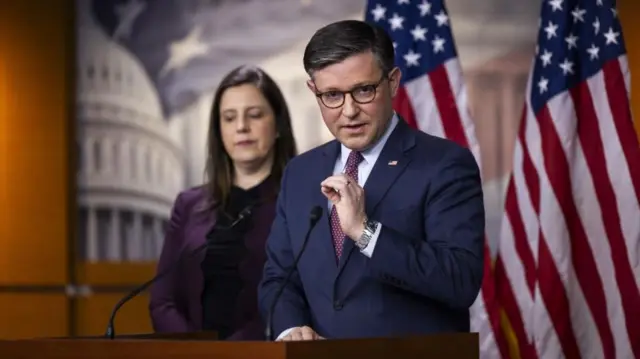 Republican Speaker of the House Mike Johnson speaks to reporters in Washington on 30 January.