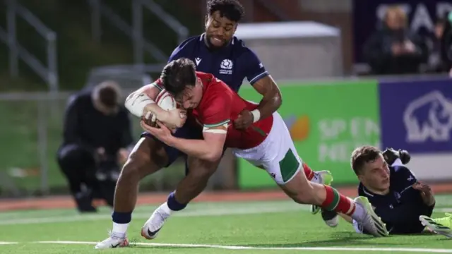 Harri Ackerman scores a try for Wales Under-20s