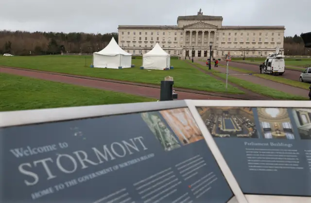 Media trucks outside Stormont