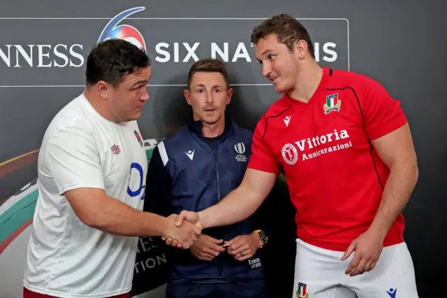 Michele Lamaro, the Italian captain, and Jamie George, the England captain shaking hands