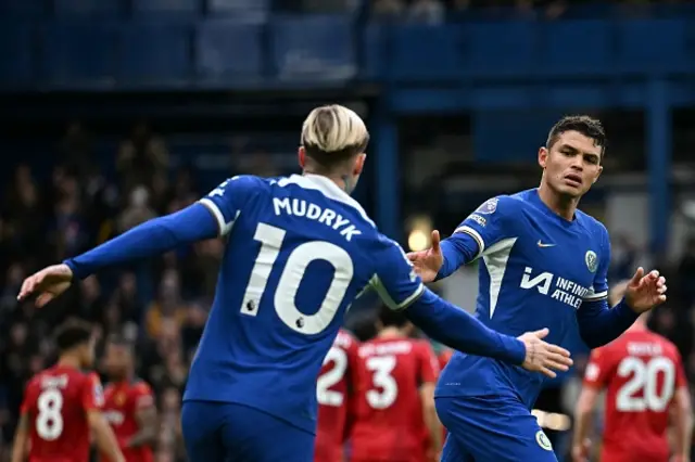 Thiago Silva celebrates after scoring