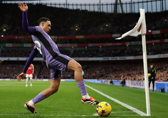 Trent Alexander-Arnold controls the ball