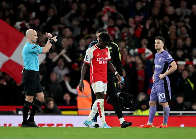 Bukayo Saka of Arsenal looks dejected as he leaves the field