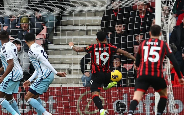 Justin Kluivert prods the ball into the net