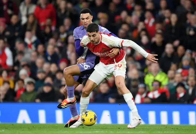 Kai Havertz of Arsenal is challenged by Trent Alexander-Arnold