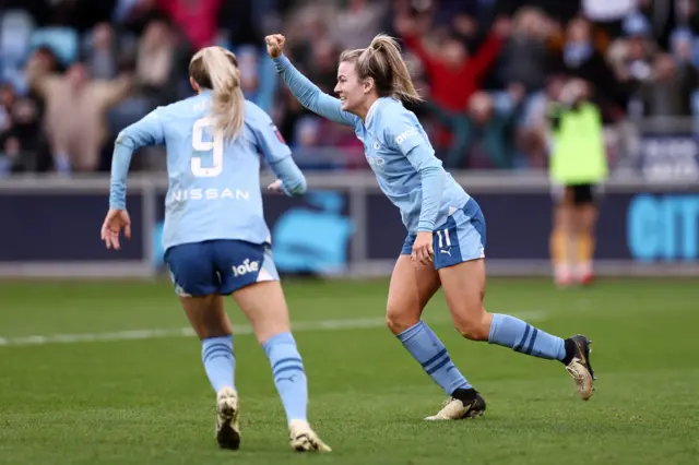 Lauren Hemp celebrates