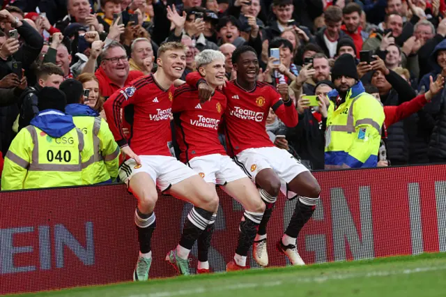 Alejandro Garnacho of Manchester United celebrates with Rasmus Hojlund and Kobbie Mainoo