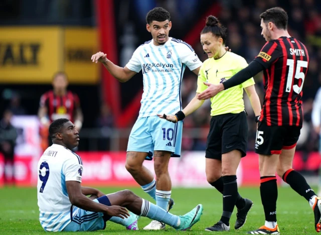 Taiwo Awoniyi sits on the floor