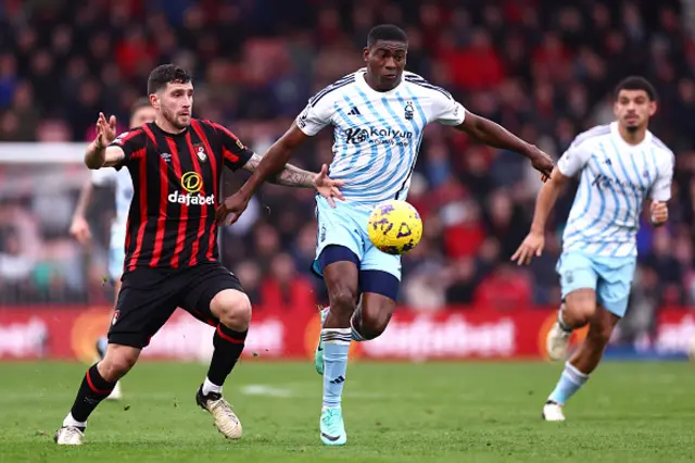 Marcos Senesi of AFC Bournemouth and Taiwo Awoniyi