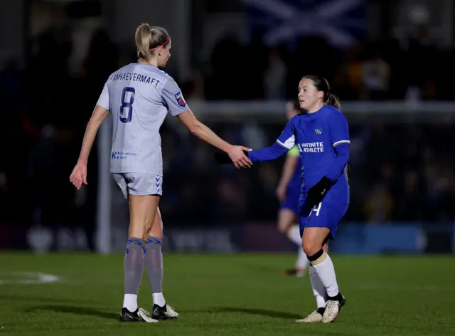 Vanhaevermaet and Kirby shake hands on the pitch at full time.