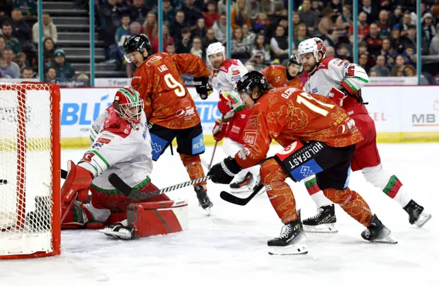 Belfast Giants Oliver Cooper scoring against the Cardiff Devils