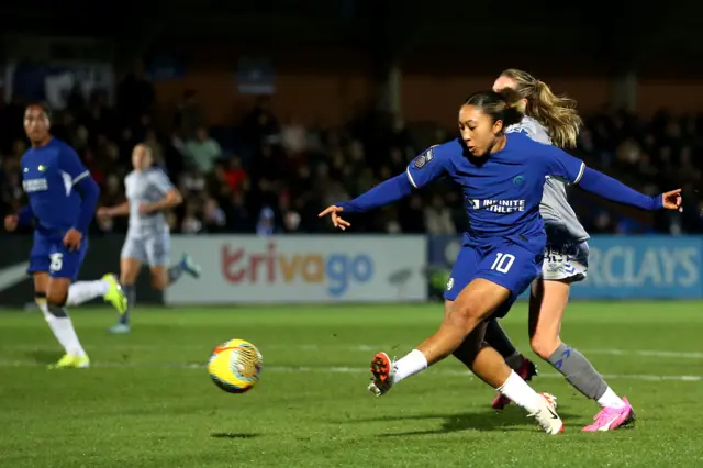 Lauren James takes aim at goal from the edge of the box.