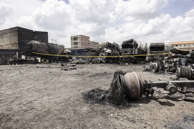 Burnt-out tankers and trucks destroyed following an explosion in the Embakasi district of Nairobi, Kenya, on Friday, Feb. 2, 2024.