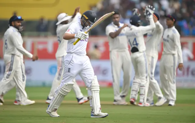 Joe Root walks off after being dismissed