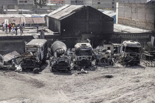 Burnt-out tankers and trucks destroyed following an explosion in the Embakasi district of Nairobi, Kenya, on Friday, Feb. 2, 2024.