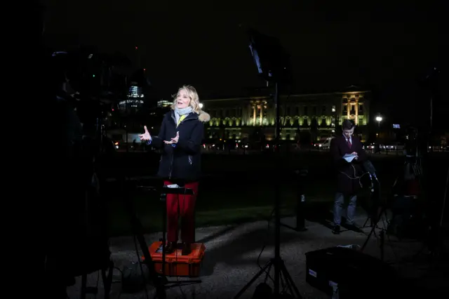 Media members report from outside Buckingham Palace, after it was announced Britain's King Charles has been diagnosed with cancer, in London, Britain, February 5, 2024. REUTERS/Hannah McKay