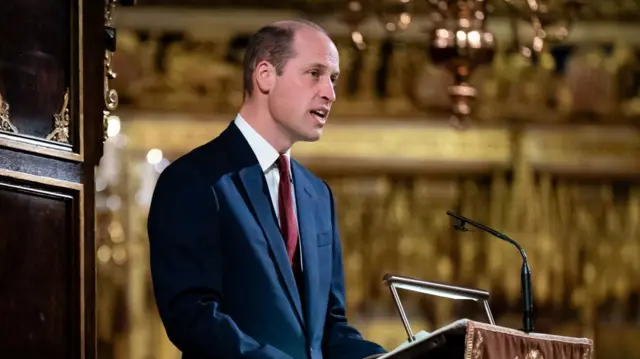 The Prince of Wales reads from the Bible during a Christmas service at Westminster Abbey in London