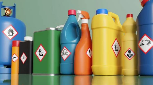 Unbranded cleaning bottles marked with corrosive and toxic warnings