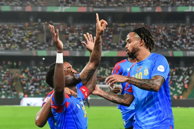 Chancel Mbemba celebrates scoring a goal for Congo.