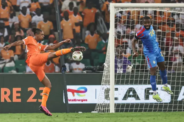 Haller shoots at goal for the opening goal of the semi-final v DRC.