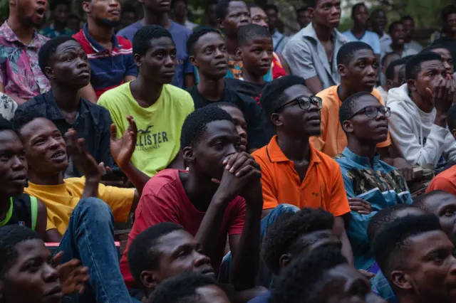 Fans watch on nervously in Nigeria.