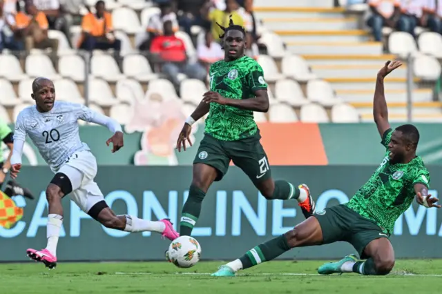 Onyeka looses the ball in midfield for Nigeria.