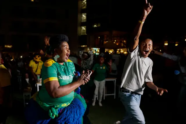 Fans go crazy celebrating the SOuth Africa equaliser.