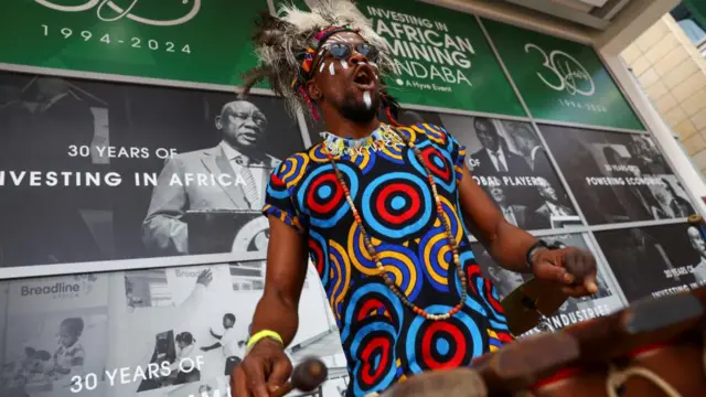 A performer entertains delegates at the Investing in African Mining Indaba 2024 conference in Cape Town, South Africa, February 6, 2024