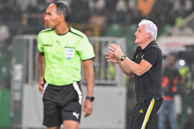 Broos shouts instructions to the South Africa players from the sideline.