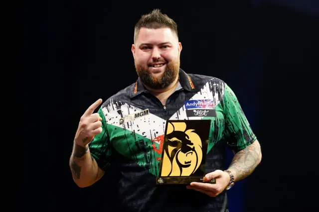 Michael Smith after winning in Cardiff on opening night of Premier League Darts 2024