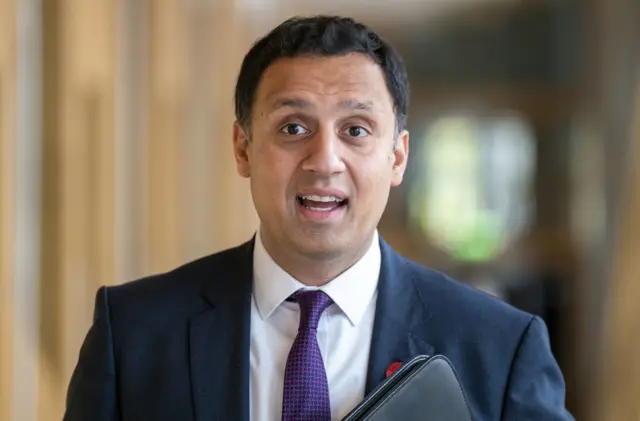 Scottish Labour leader Anas Sarwar walking forwards