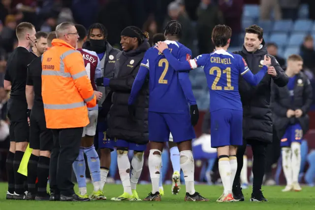 Mauricio Pochettino congratulates his players after their FA Cup win at Villa Park