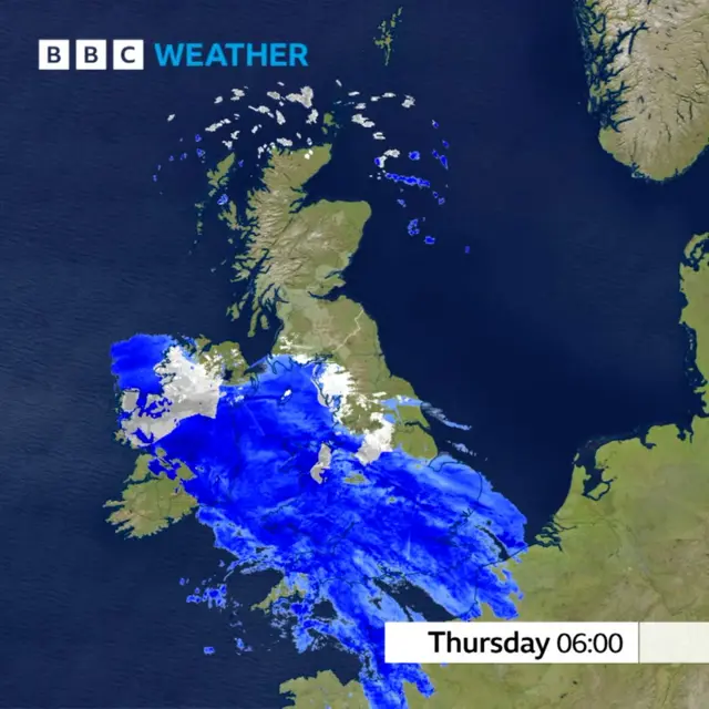 Weather forecast map showing rain across England, Wales and Ireland, with some snow patches in northern Wales and England