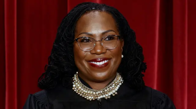 ILE PHOTO: U.S. Supreme Court Associate Justice Ketanji Brown Jackson poses during a group portrait at the Supreme Court in Washington, U.S., October 7, 2022.