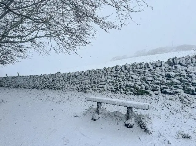 A snowy bench in Buxton, Derbyshire