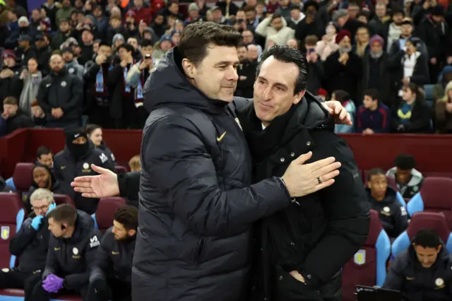 Mauricio Pochettino and Unai Emery hug before the FA Cup fourth-round replay