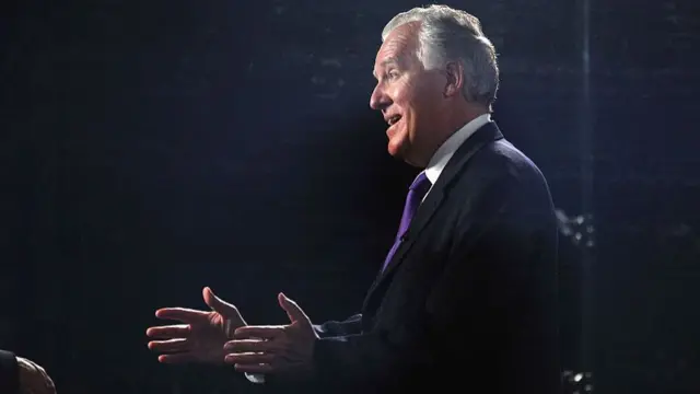 Side profile of Lord Peter Hain giving a speech