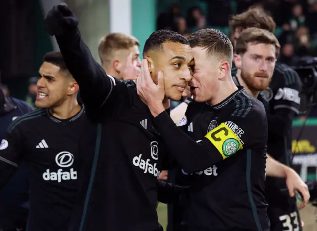 Adam Idah of Celtic celebrates his team's second goal from the penalty spot