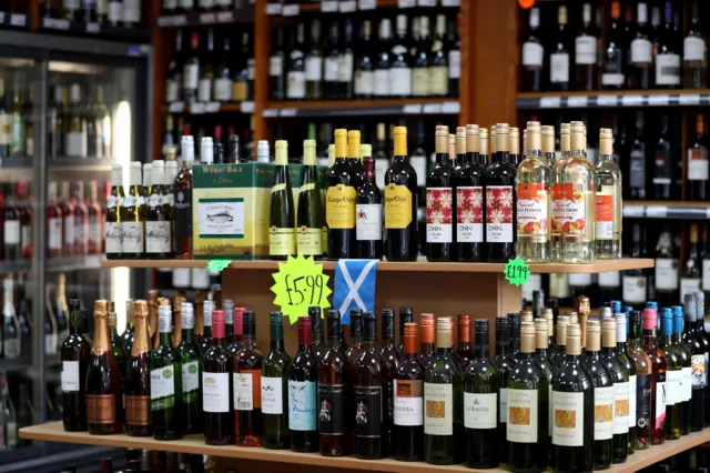 A table of alcohol in a shop