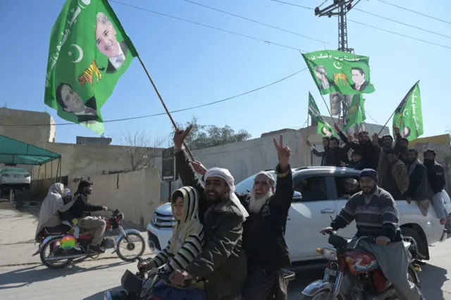 Supporters of Sharif's Pakistan Muslim League-N (PML-N) celebrate in Rawalpindi