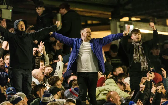 Greenock Morton fans celebrate as George Oakley scores to make it 2-0 during a Scottish Gas Scottish Cup fifth round match between Greenock Morton and Motherwell at Cappielow Park