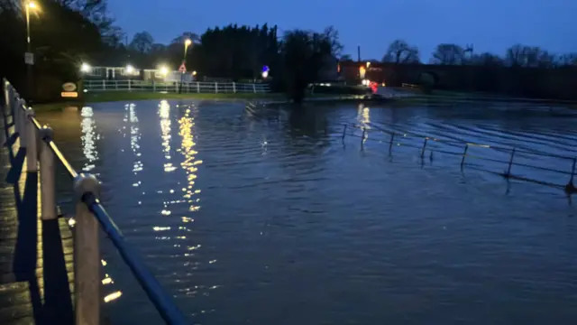 Main Street between Wolston and Brandon near - or under - the River Avon