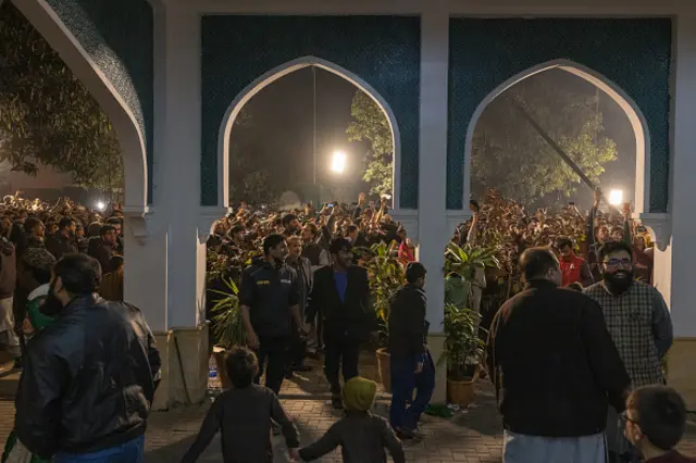 Supporters of Nawaz Sharif - leader of the Pakistan Muslim League Nawaz (PMLN) - gather as he spoke in Lahore earlier