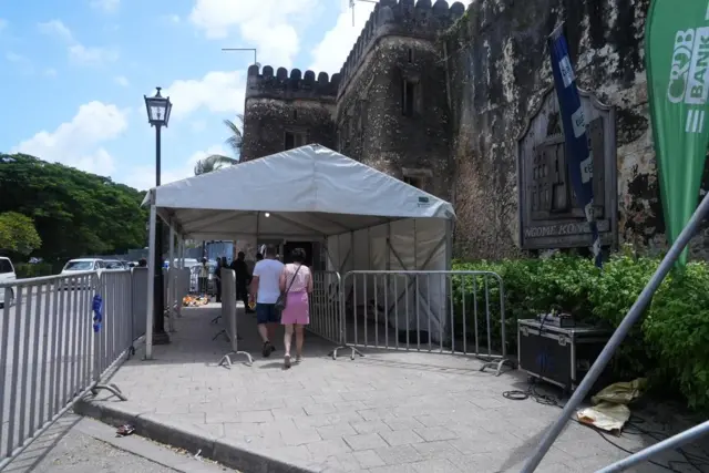 People entering the festival site.