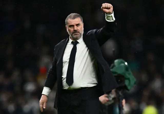 Ange Postecoglou puts his fist up in the air