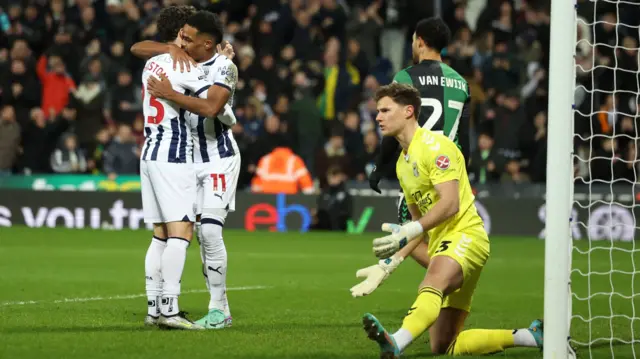 Grady Diangana (left) hugs a team-mate while Coventry keeper Ben Wilson holds out his hands