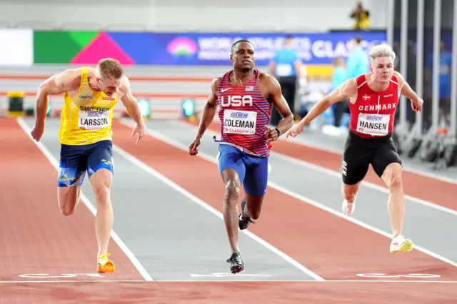 Christian Coleman crosses the finish line